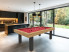 billard table FEELING finition bicolore chêne doré veiné et pieds nano noir avec tapis de jeu de billard américain rouge