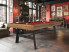 billard Vintage en chêne vintage avec tapis rouge et pieds noirs, dans un bar de style industriel rappelant une vinothèque rétro